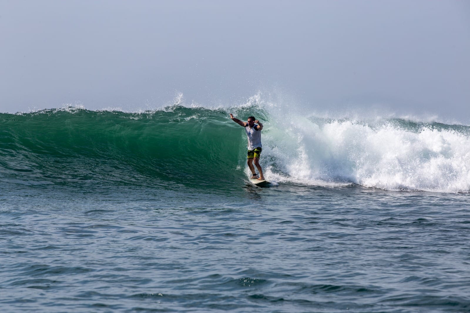 Stand up paddleboarding at sunset